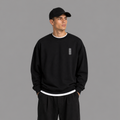 NAEL — Minimal Black Crew with Embroidered Logo